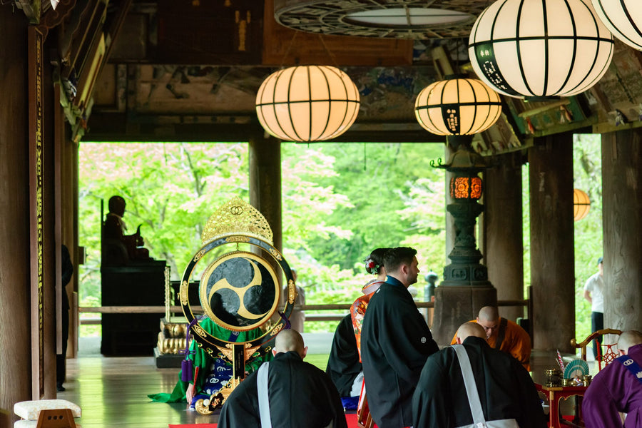 A view from inside the main hall out to the fresh green maples of Hasedera